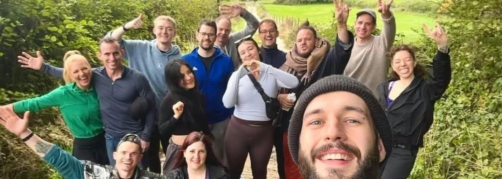 Jamie with a Self Integration School group on a country path